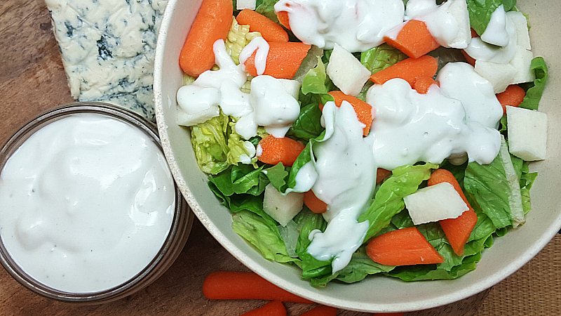 bowl of salad with homemade blue cheese dressing