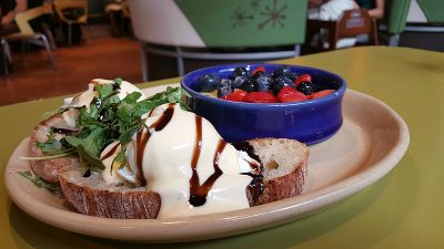 Eggs Benny and Fruit at Snooze AM Eatery Tustin Marketplace