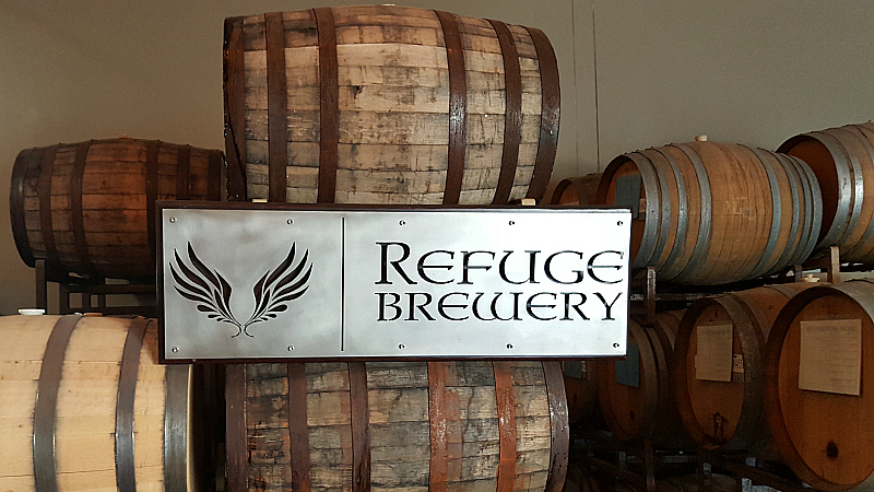 refuge brewery barrels tasting room