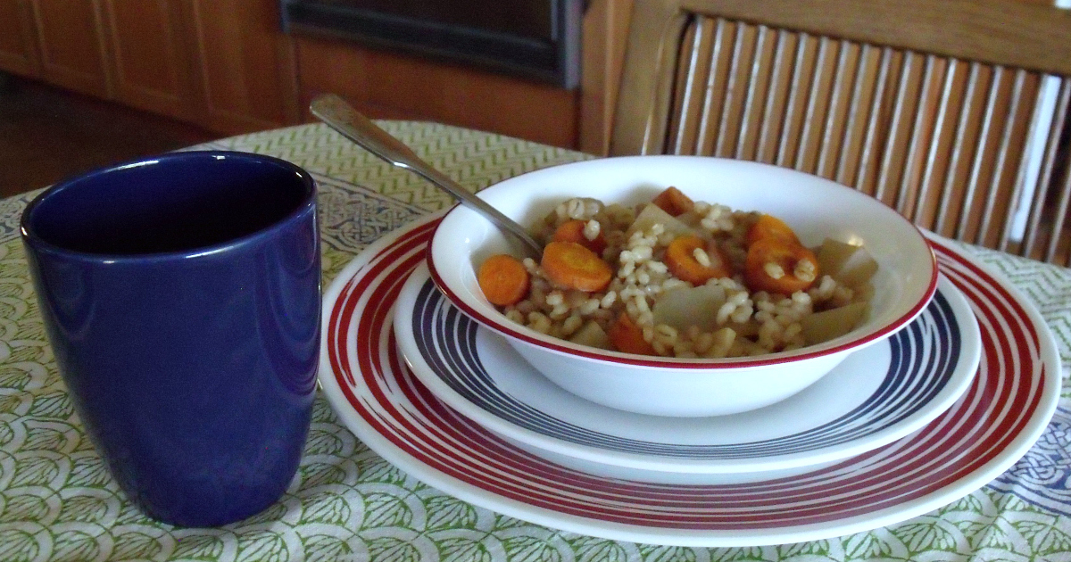 bowl of vegan barley stew on table