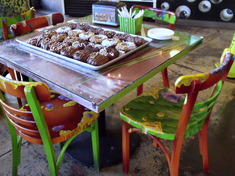 tray of donuts on a table at psycho donuts san jose