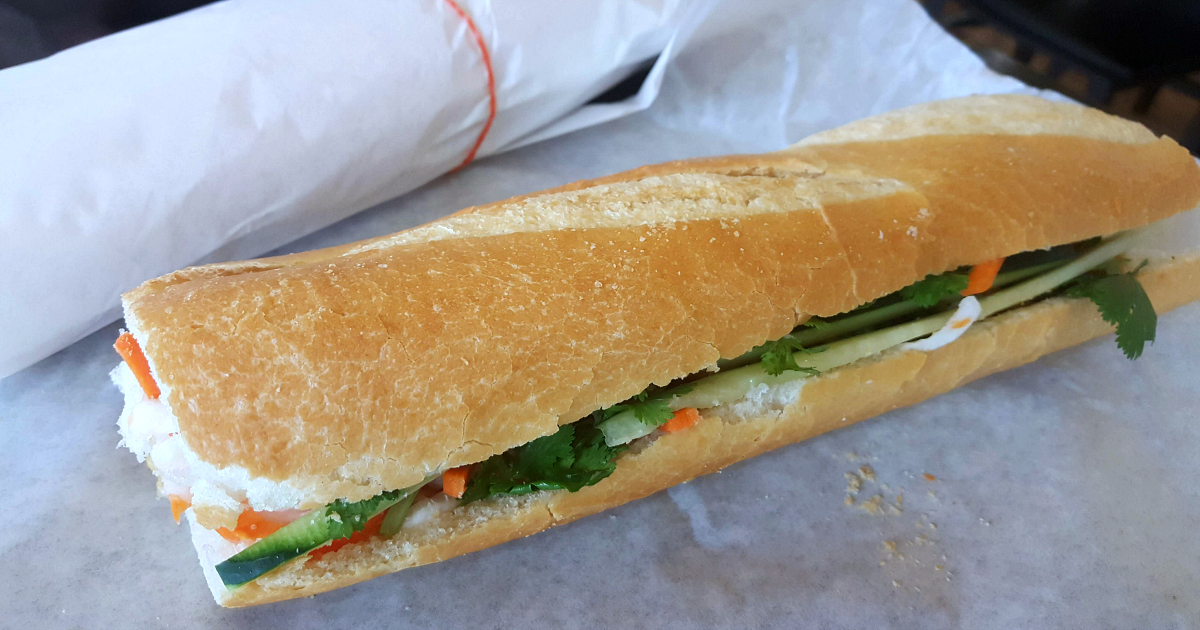 banh mi sandwiches wrapped in white paper