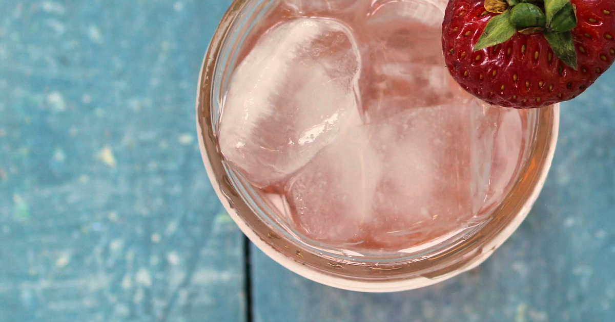 overhead close up strawberry soda mason jar