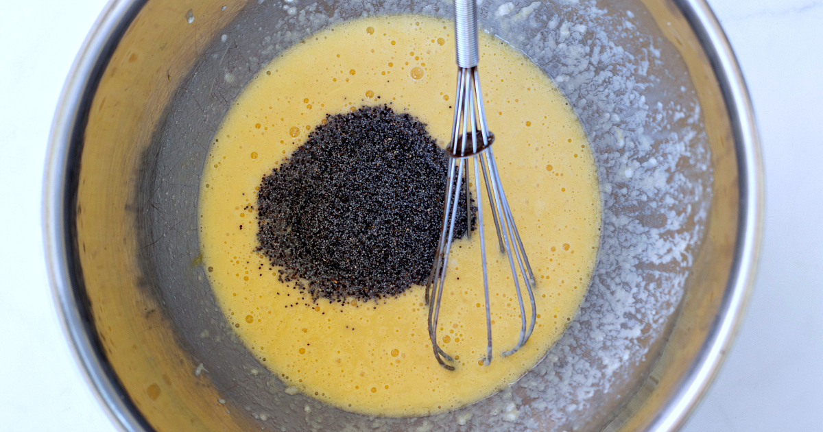 whisking poppy seeds into wet ingredients