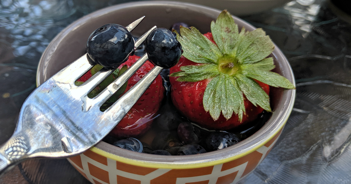 blueberries on fork