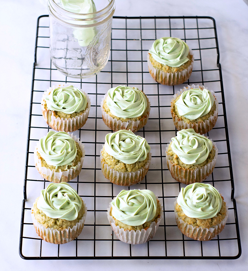 frosted cupcakes on cooling rack