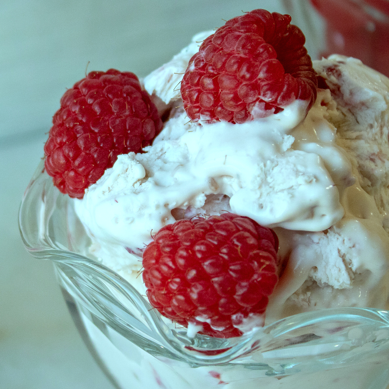 close up of raspberry ice cream sundae