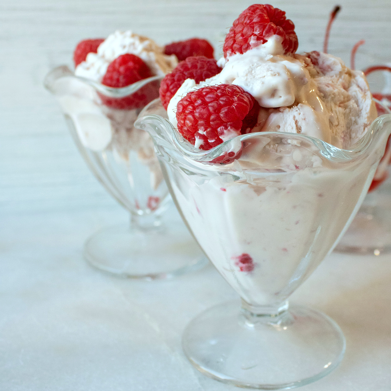 raspberry ice cream with fresh berries