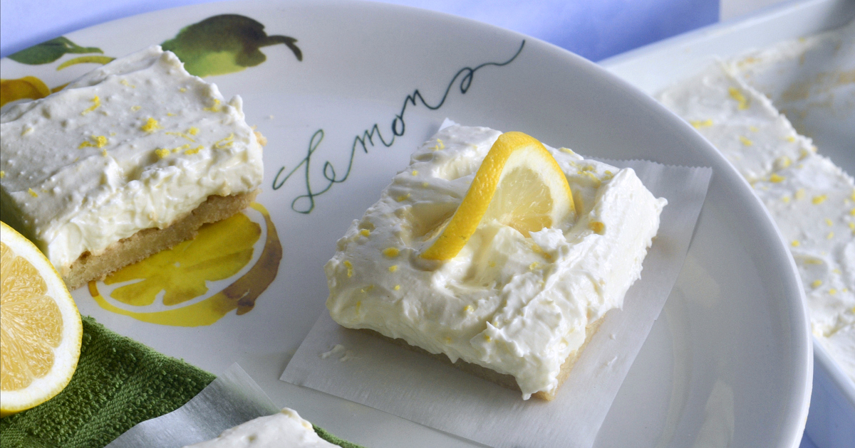 lemon bars on a white plate