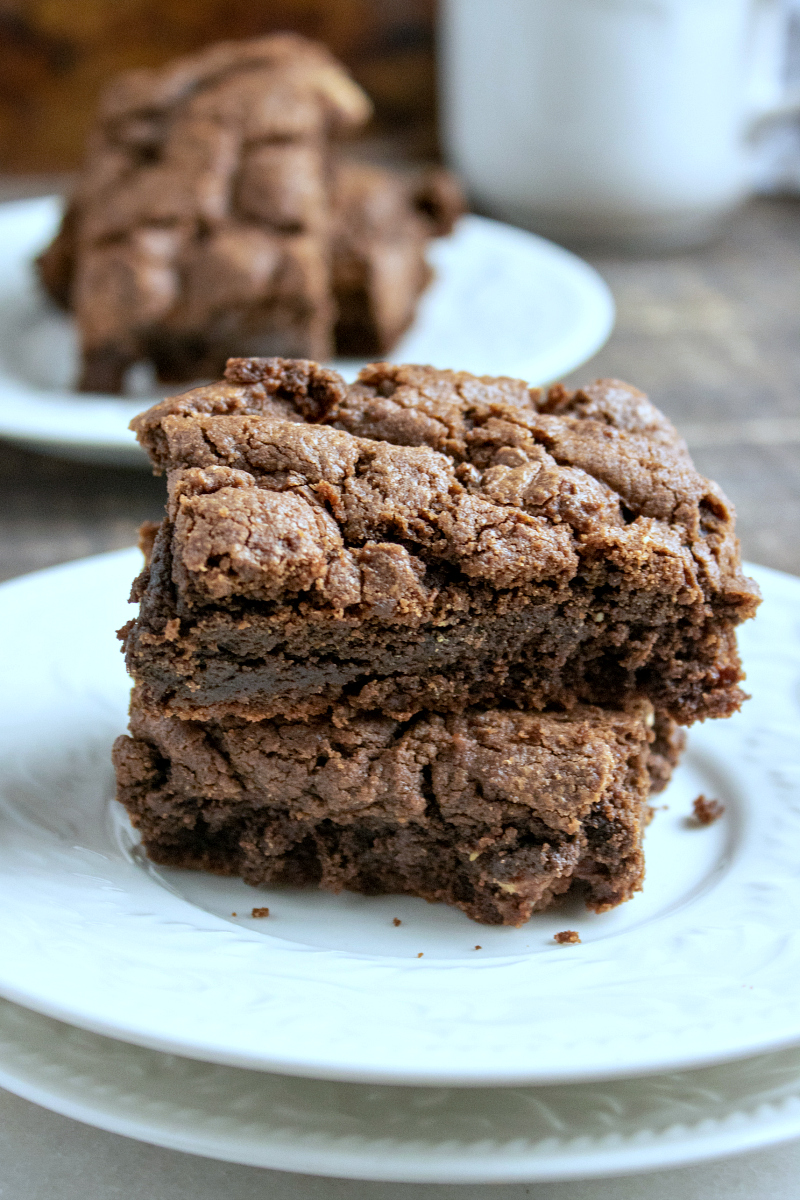 no text pin stack of brownies on white plates