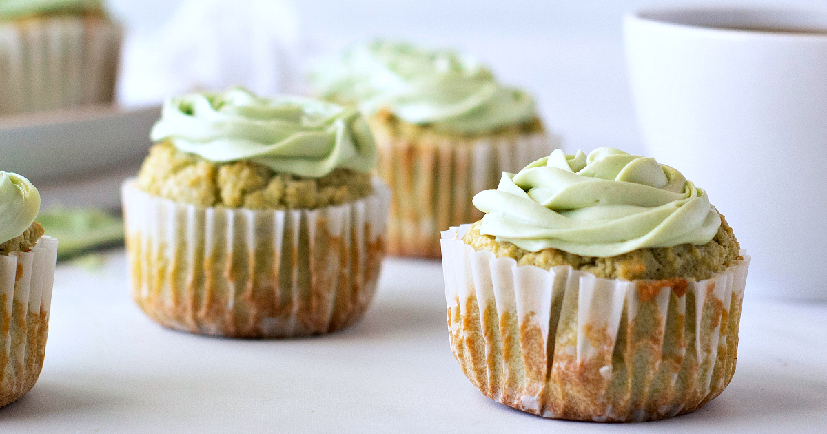 several matcha green tea cupcakes and coffee