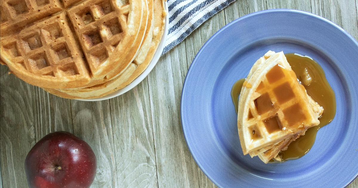 overhead view of waffles on blue plate