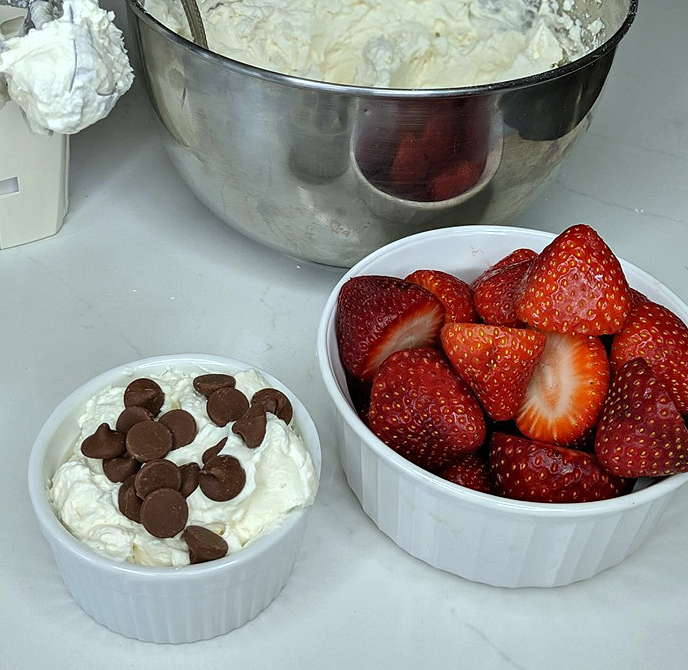 strawberries whipped cream and chocolate