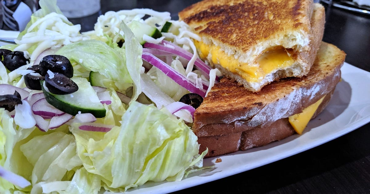 grilled cheese sandwich and salad at oak shores lake morena