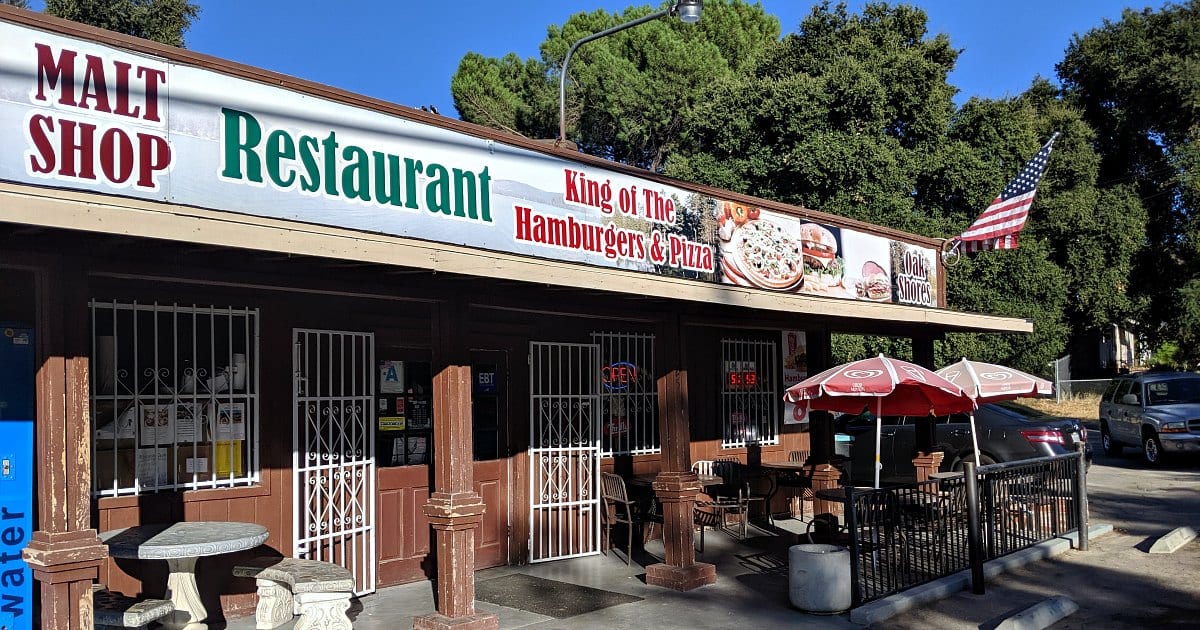 sign for oak shores malt shop restaurant