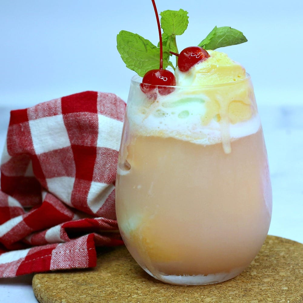 insta square image of boozy sherbet float with gingham napkin