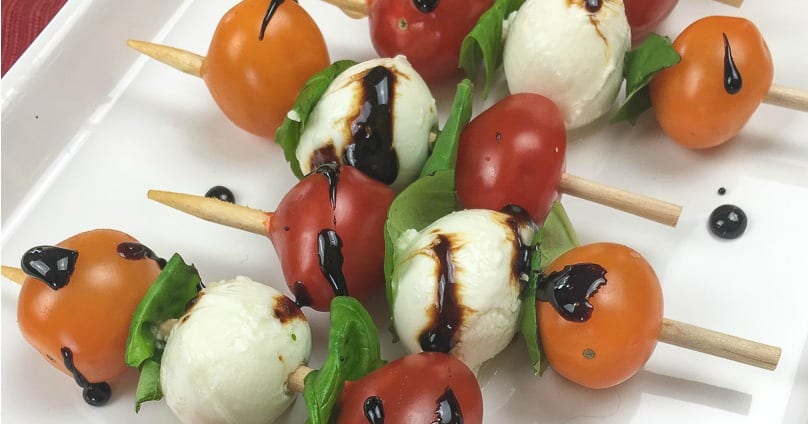 close up traditional caprese kebab with balsamic glaze