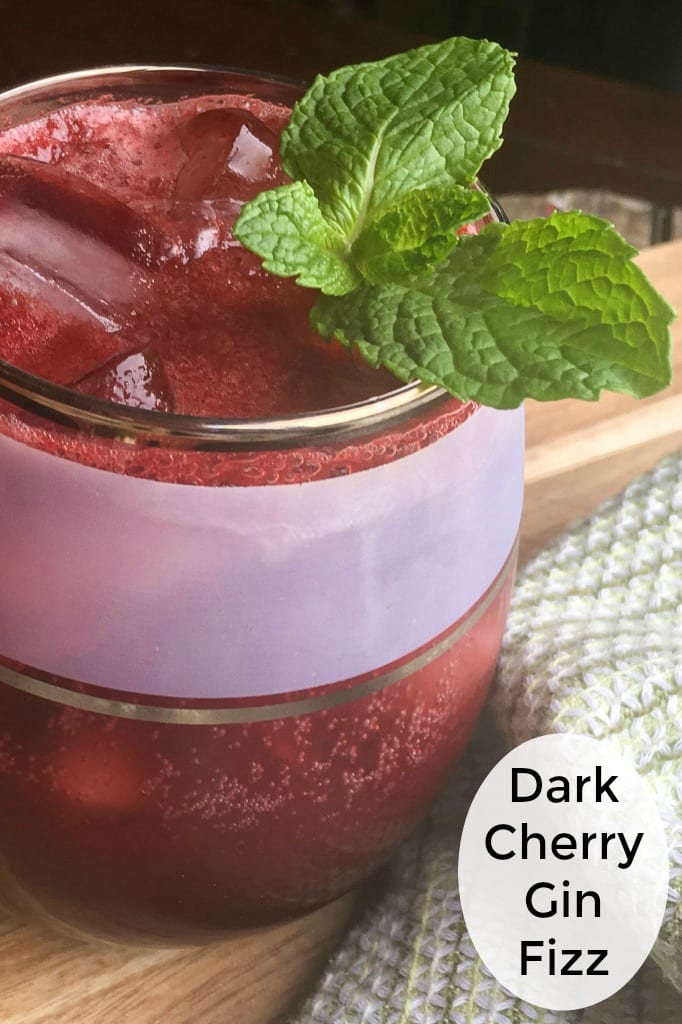 Dark Cherry Gin Fizz Cocktail with a Mint Garnish #Cocktail #GinFizz #GinCocktail #CherryCocktail