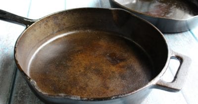 two cast iron skillets