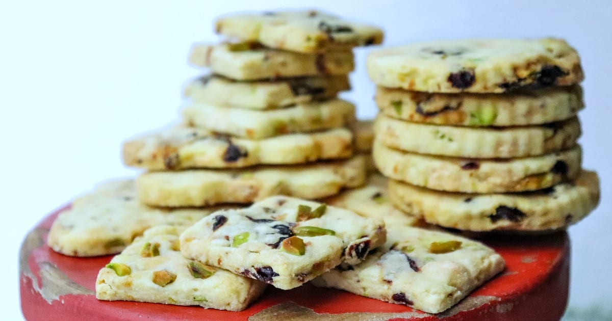 piles of pistachio cookies