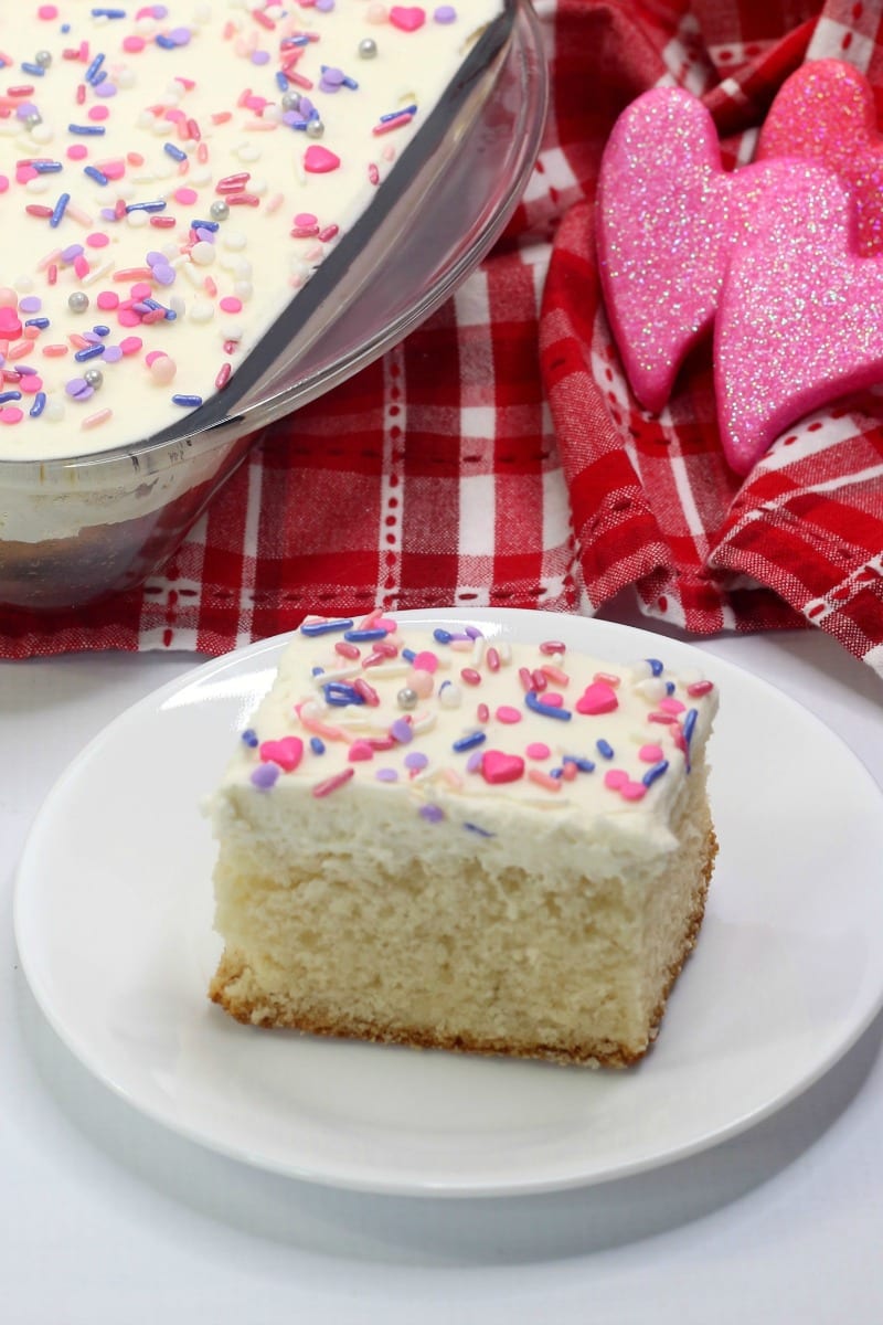 Bake a sheet cake for Valentine's Day, so you can share the love with friends and family. The moist white cake is topped with decadent buttercream frosting