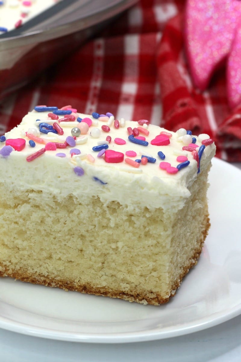 Bake a sheet cake for Valentine's Day, so you can share the love with friends and family. The moist white cake is topped with decadent buttercream frosting