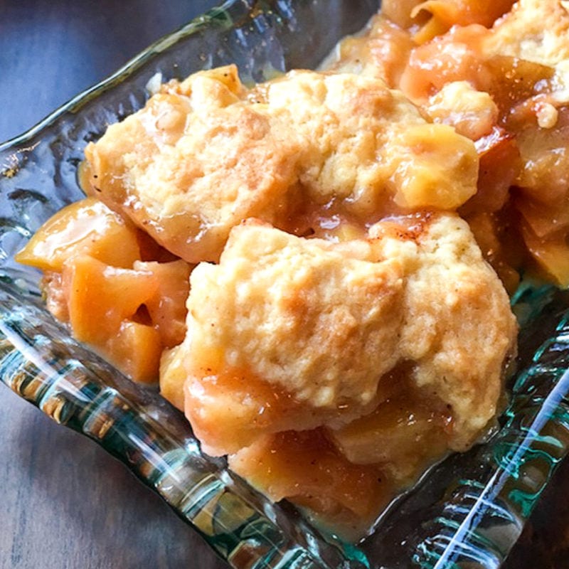 peach cobbler on glass plate