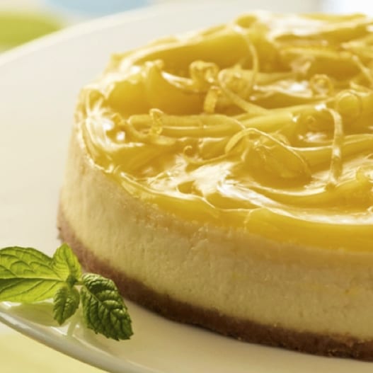 cheesecake topped with lemon curd