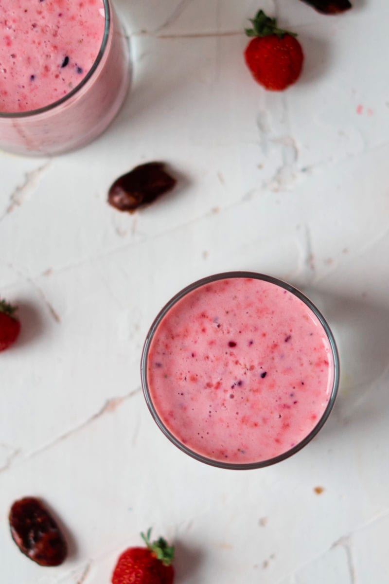 Embrace pure deliciousness with this Strawberry Date Smoothie recipe! Forget sugary drinks, this recipe utilizes nature's bounty – fresh strawberries and naturally sweet dates – to create a creamy and delightful beverage that satisfies your taste buds. Made with just 4 ingredients, it's the perfect way to indulge in a treat anytime.