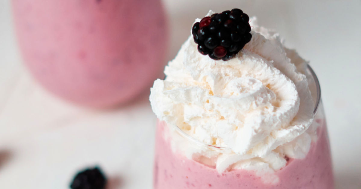 whipped cream on blackberry jam smoothie