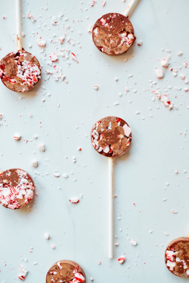 Chocolate Peppermint Lollipops Recipe that is easy to make with crushed candy canes and milk chocolate.