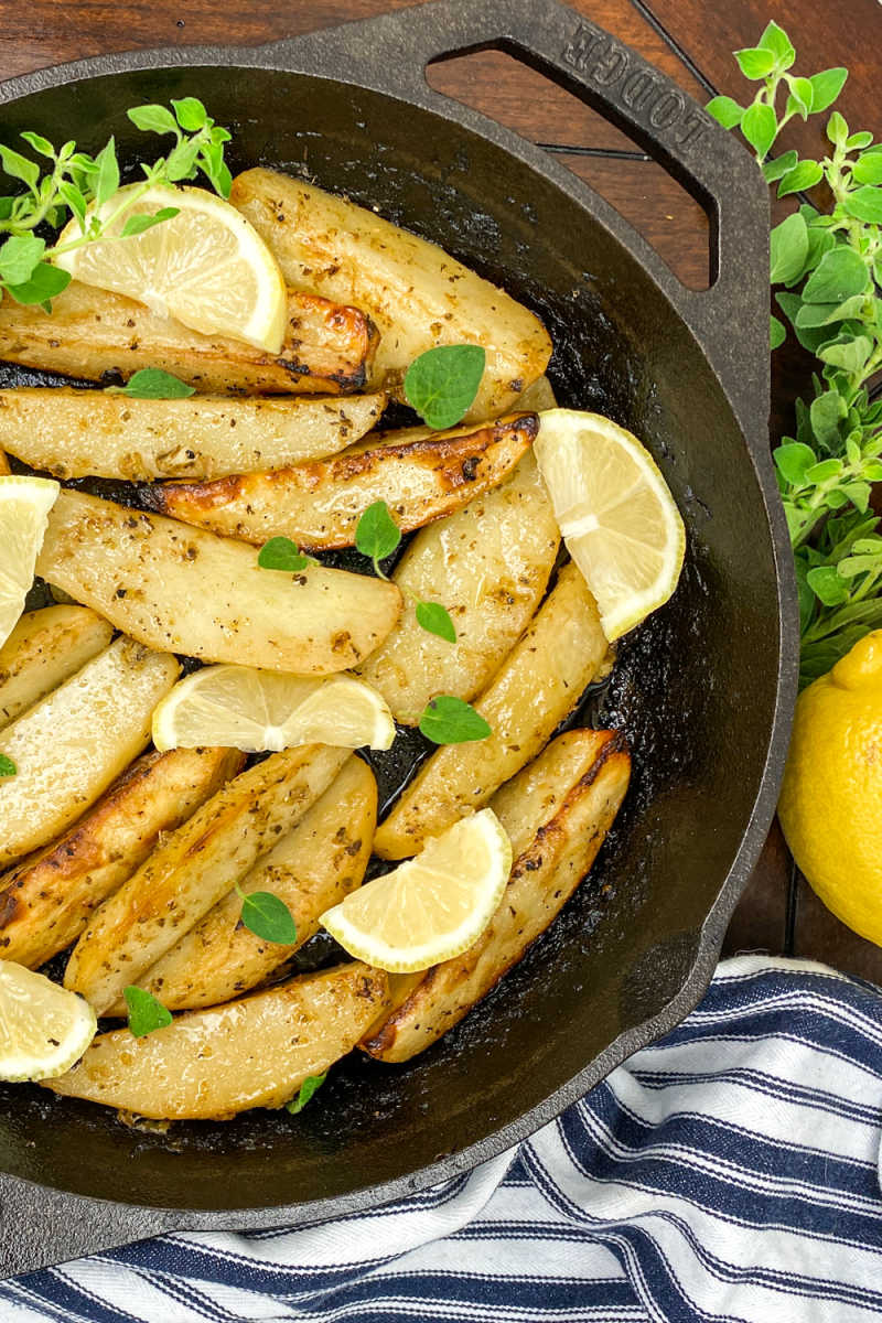 Enjoy these lemon cast iron skillet Greek potatoes, when you want a budget friendly dish that has traditional Mediterranean flavors.