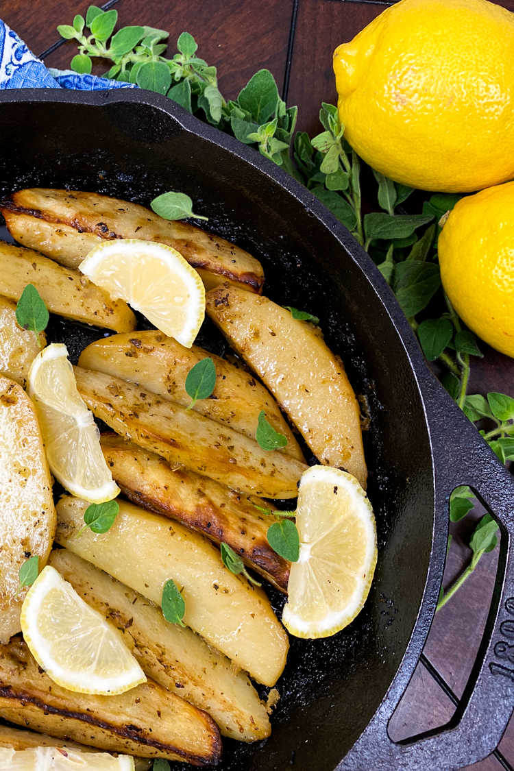 Enjoy these lemon cast iron skillet Greek potatoes, when you want a budget friendly dish that has traditional Mediterranean flavors.