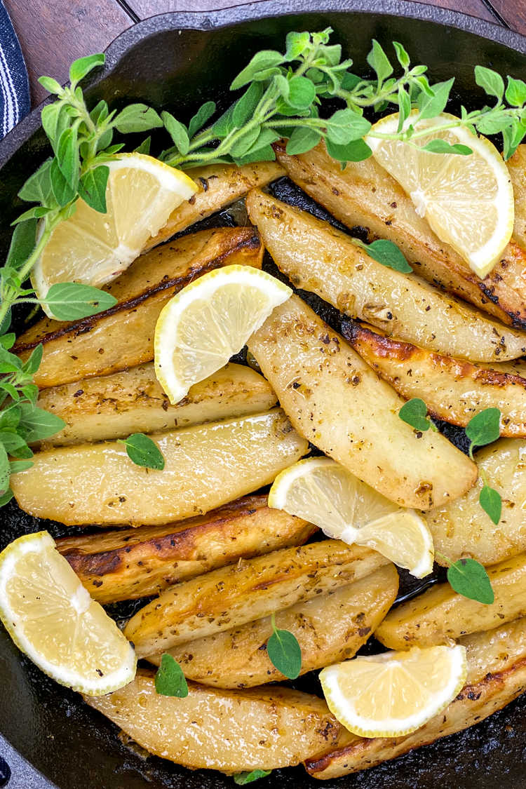 Enjoy these lemon cast iron skillet Greek potatoes, when you want a budget friendly dish that has traditional Mediterranean flavors.