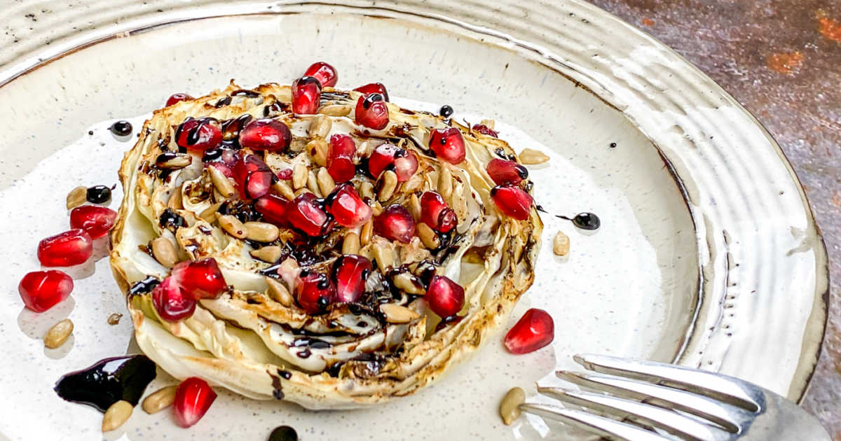 cabbage steak with balsamic glaze and pomegranate