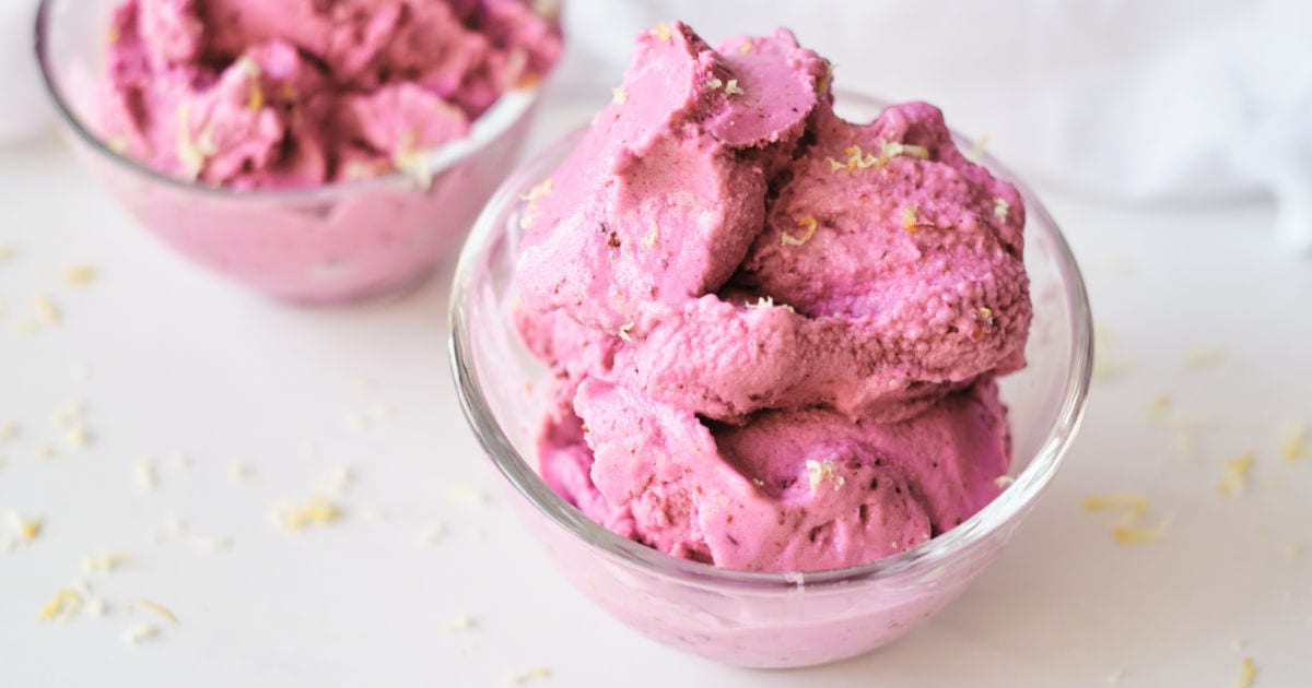 bowls of homemade blackberry frozen yogurt.