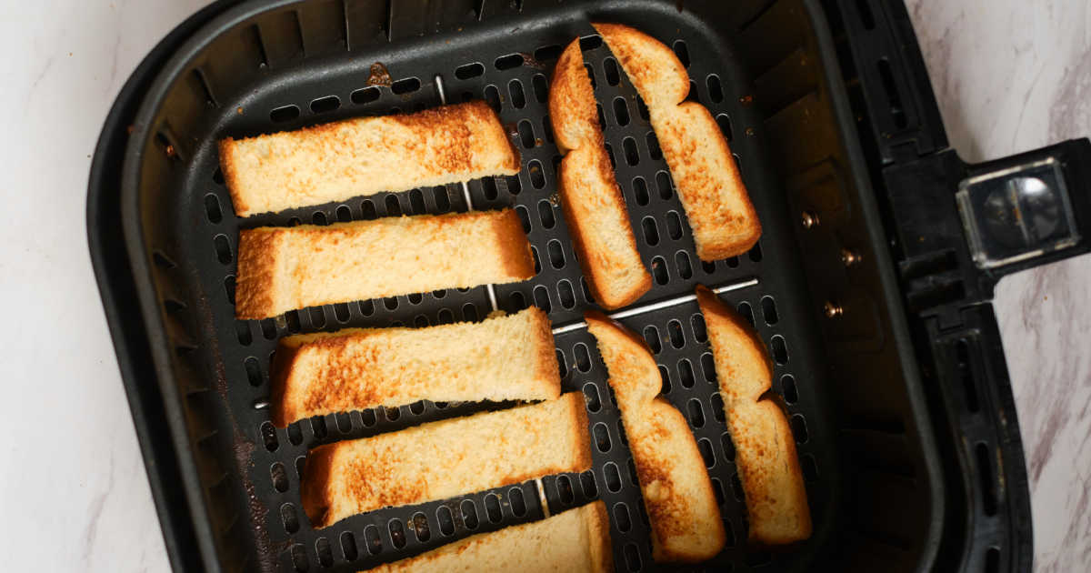 French toast sticks in Air Fryer tray. 