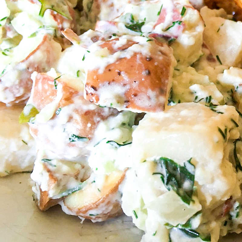 creamy herbed red potato salad made in a microwave oven.