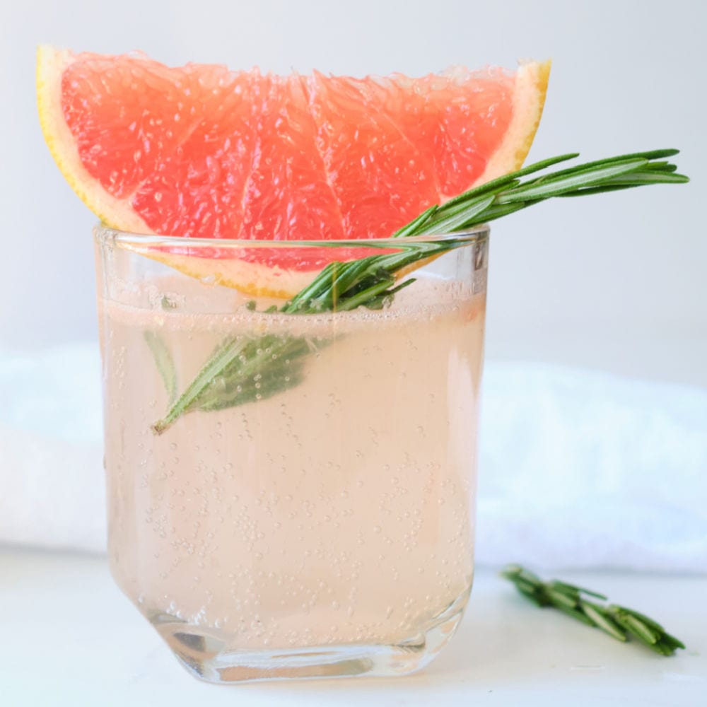 glass of sparkling pink grapefruit juice.