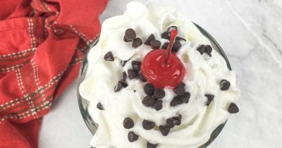 overhead view of whipped cream topped ice cream soda.
