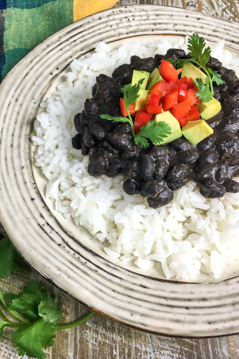 Make my Instant Pot black beans and rice, when you want a satisfying vegan dish inspired by the flavors of Cuba.