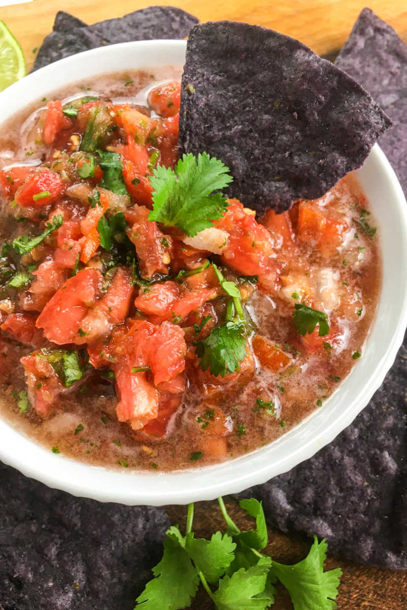 Chips are so much better, when they are served with homemade salsa made with fresh tomatoes, jalapeno, garlic, onion and cilantro. 