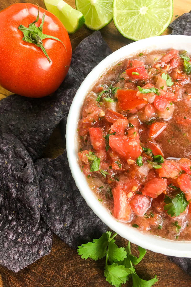 Chips are so much better, when they are served with homemade salsa made with fresh tomatoes, jalapeno, garlic, onion and cilantro. 