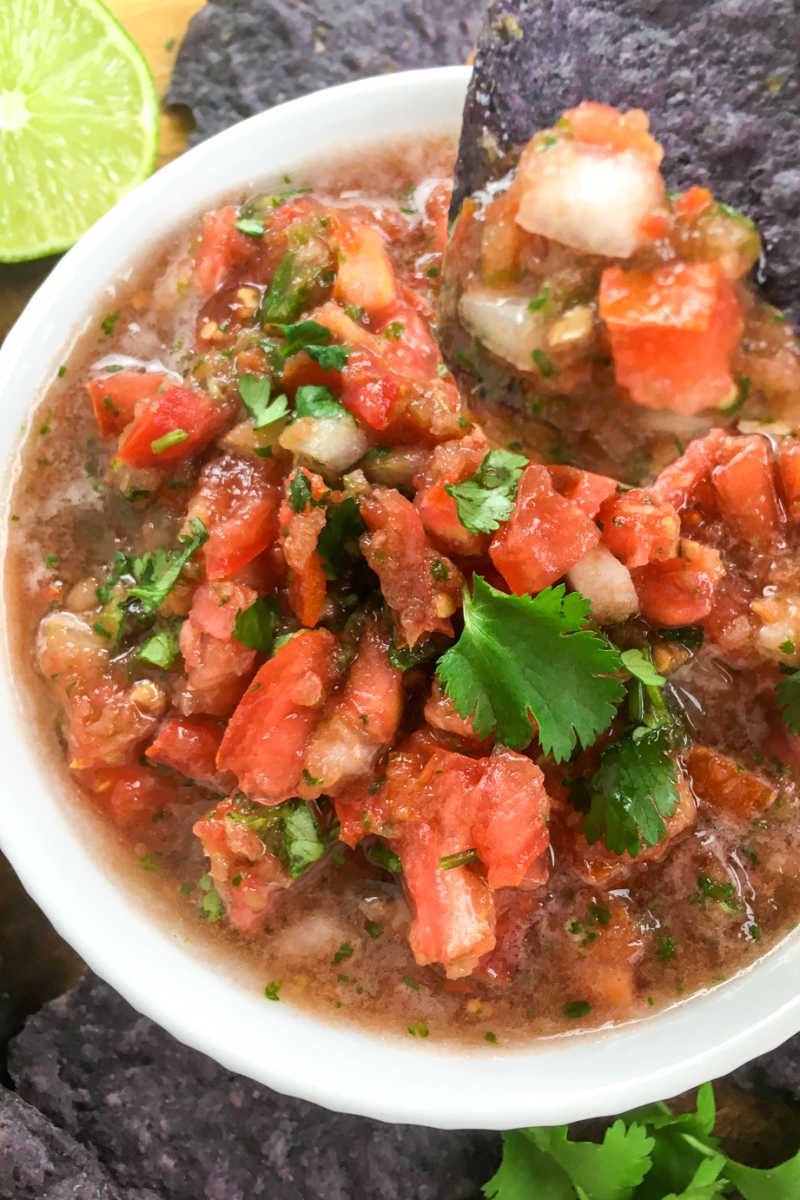 Chips are so much better, when they are served with homemade salsa made with fresh tomatoes, jalapeno, garlic, onion and cilantro. 