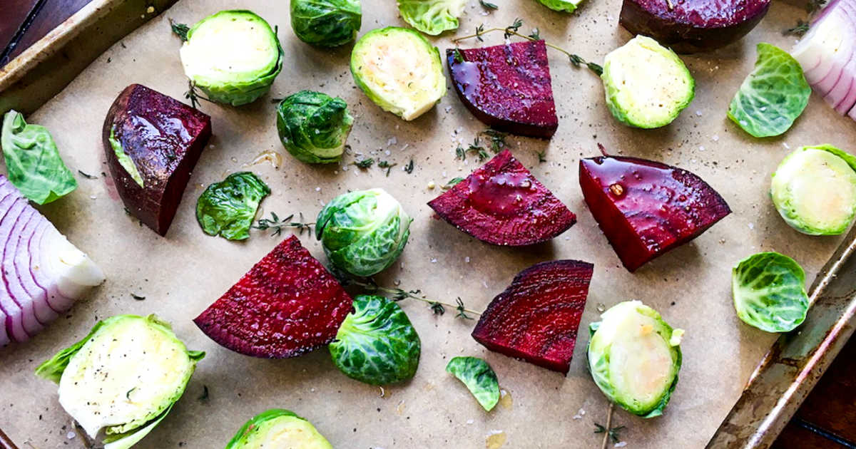 brussels sprouts and beets on pan.