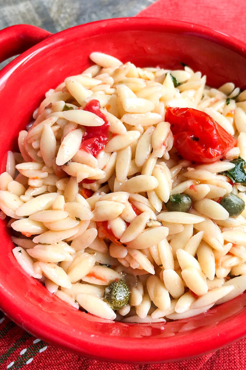 Enjoy this Mediterranean orzo salad with capers and fresh tomato, when you want a satisfying chilled pasta dish that is simple to prepare.