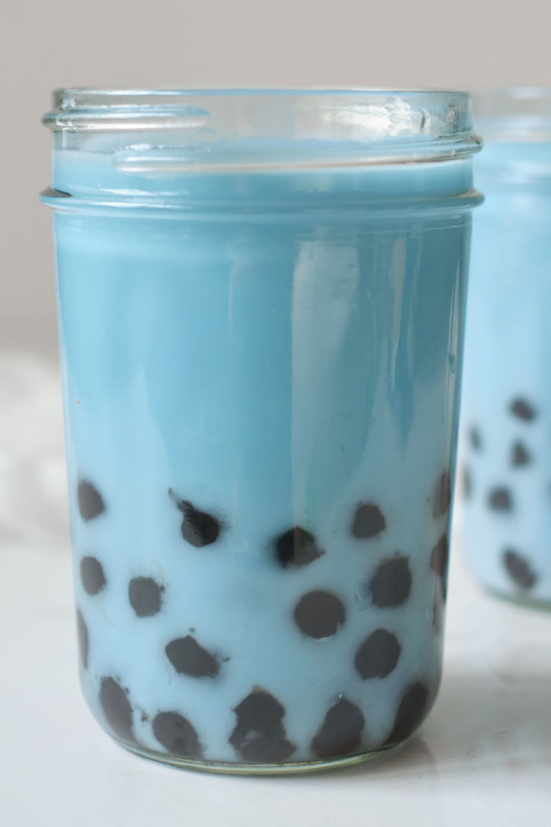 Blue boba milk tea is delicious and the beautiful color is all natural, since the bubble tea is made with butterfly pea flower tea.