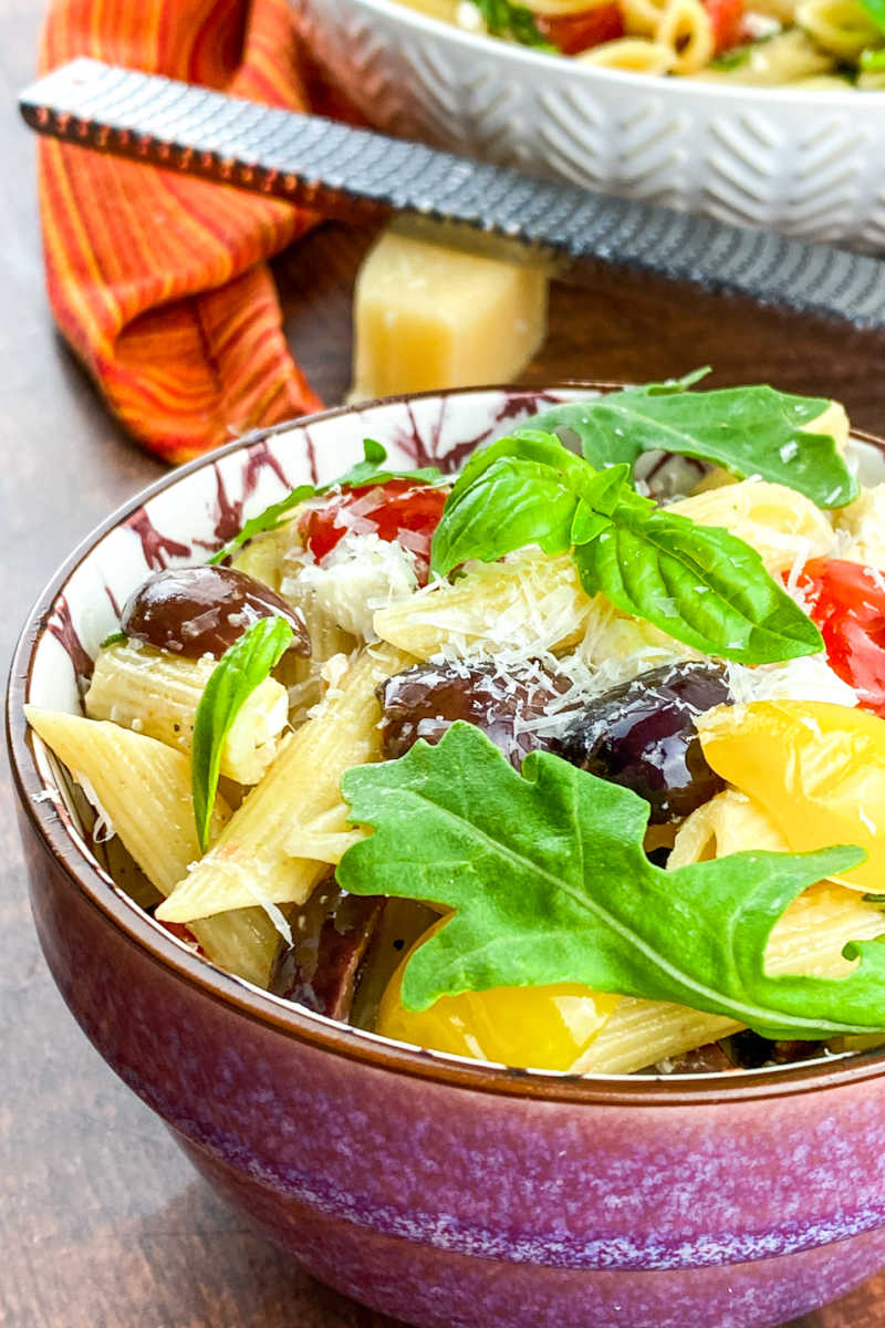 A Greek pasta salad with feta cheese is the perfect side dish, especially when it has a tangy lemon dressing and fresh ingredients.