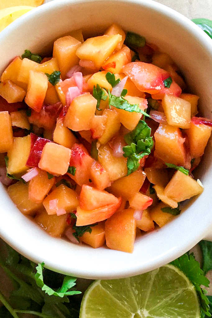 Add a burst of fresh fruit flavor to your snacks and meals, when you make this beautiful and delicious jalapeno peach salsa.