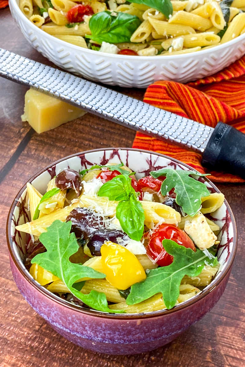 A Greek pasta salad with feta cheese is the perfect side dish, especially when it has a tangy lemon dressing and fresh ingredients.